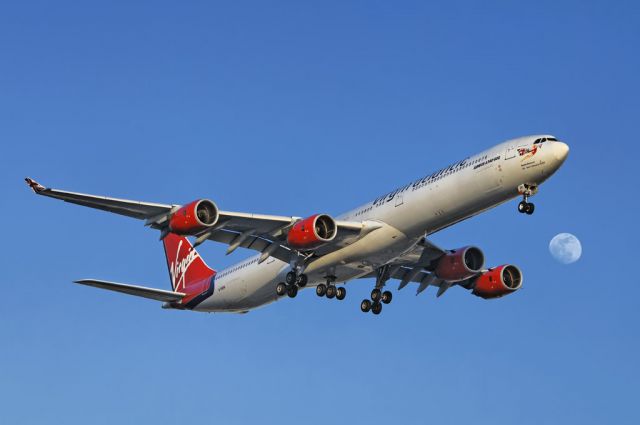 G-VSSH — - As a waxing gibbous moon rises, a Virgin Atlantic Airways operated Airbus A340-600 series widebody jet nears touch down at the Los Angeles International Airport, LAX, in Westchester, Los Angeles, California