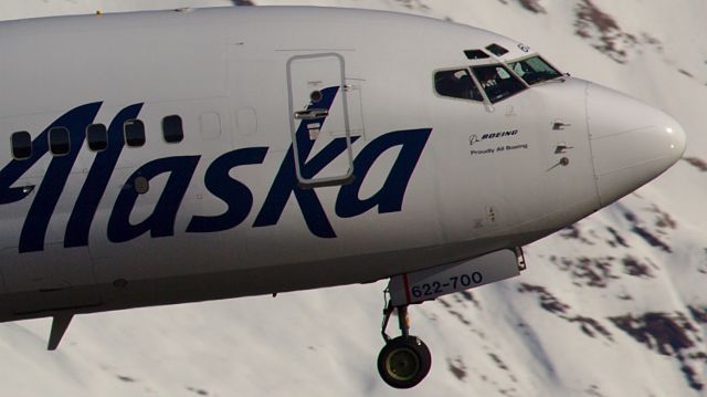 Boeing 737-700 (N622AS) - Walking the dog in the Mendenhall Wetlands.  The flight crew of Alaska 62 landing at JNU.