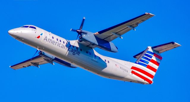 de Havilland Dash 8-100 (N329EN) - Really miss these old Dash 8s.  Charlotte is a little less interesting without them.