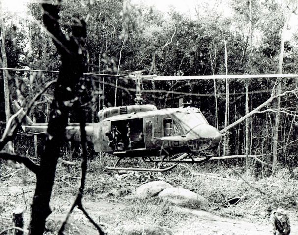 6616834 — - 119th Assault Helicopter Co. slick, Gator 834, extracting 4th Infantry Div. LRRP recon team in the Western Highlands of Vietnam, 1969.