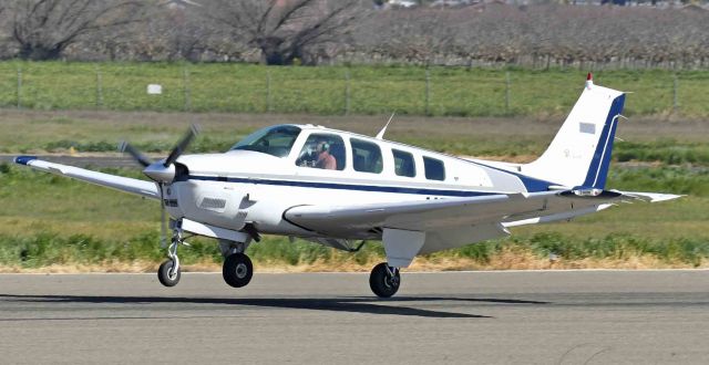 Mooney M-20 Turbo — - Landing, Runway three-zero, Merced-Yosemite Regional Airport