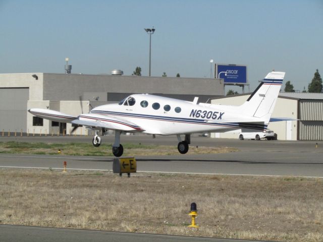 Cessna 340 (N6305X) - Taking off RWY 24