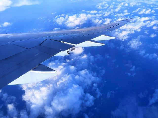 BOEING 747-8 (D-ABYN) - Gorgeous winter light as we turn over the North Atlantic Ocean