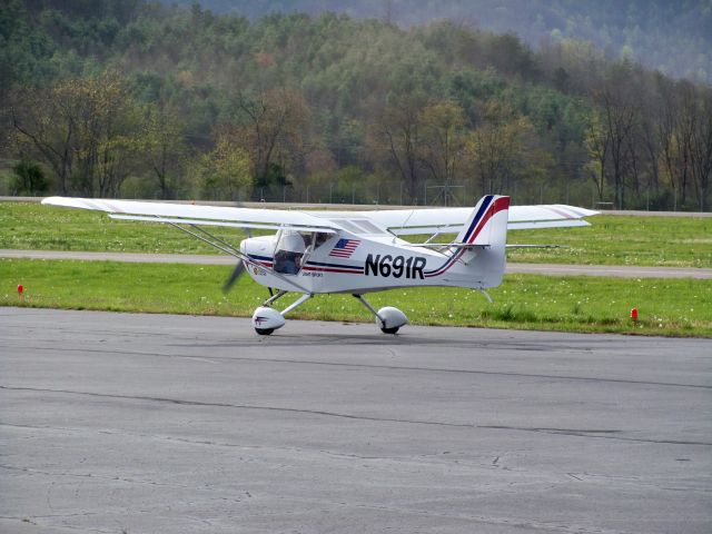 Piper Saratoga (N691R) - Private plane taxiing on the tarmac at Macon County Airport on April 7, 2011 after a flight from Florida.