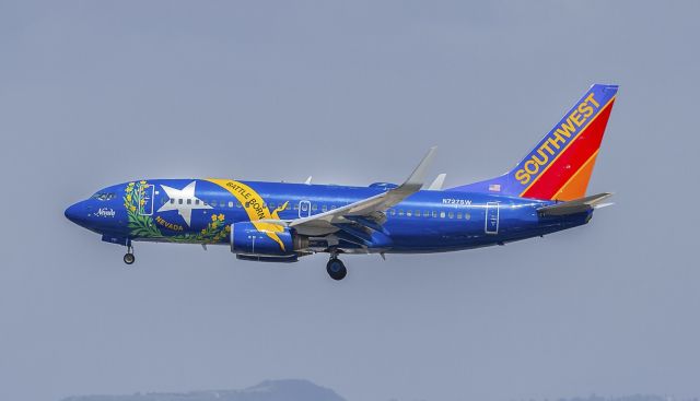 Boeing 737-700 (N727SW) - Nevada One on her way down to runway 24R at LAX on a misty afternoon