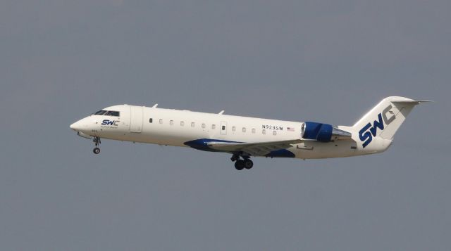 Canadair Regional Jet CRJ-200 (N923SW) - Charter West takes off on runway 31 at Nashville, Tn.