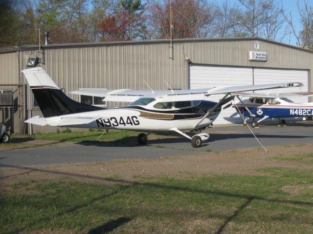 Cessna Skylane (N9344G) - Parked in front of Twin City Airmotive.