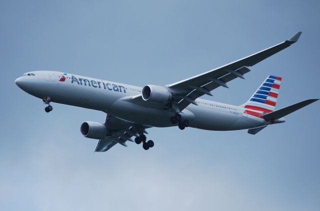 Airbus A330-300 (N273AY) - On approach for runway 18C, flying over the West Meck H.S. baseball field - 6/27/15