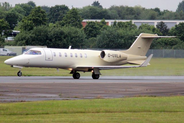 Learjet 40 (G-UXLA) - SaxonAir Learjet 40 departing rwy 24 on 6-Jun-22 heading for LEIB as SXN40B.