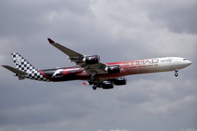 Airbus A340-600 (A6-EHJ) - One of the most beautiful liveries. Etihad A340-600 F1 Livery A6-EHJ ready to land in Athens after a summer storm. Too bad they changed the livery