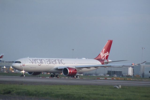 Airbus A330-900 (G-VJAZ) - The first Virgin Atlantic A330-900 holding short of runway 27R. This flight is special as it is the first commercial flight of the type for Virgin Atlantic. This flight was LHR-BOS as VS11.br /br /Location: Northern Perimiter Road, beside runway 27R.br /Date: 27.10.22 (dd/mm/yy).