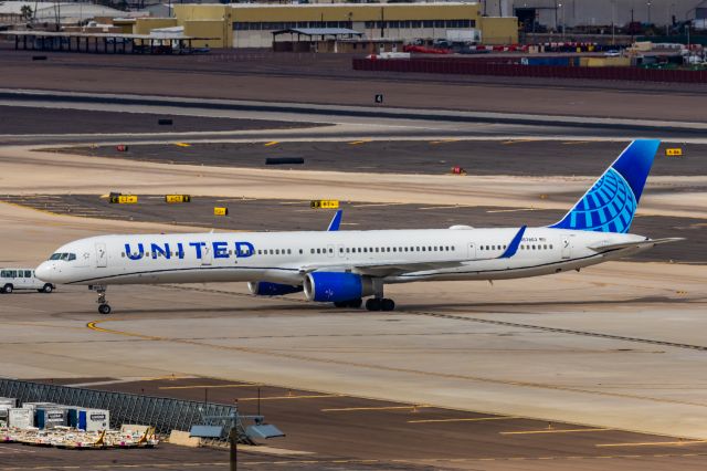 BOEING 757-300 (N57863) - A United Airlines 757-300 taxiing at PHX on 2/13/23, the busiest day in PHX history, during the Super Bowl rush. Taken with a Canon R7 and Canon EF 100-400 II L lens.