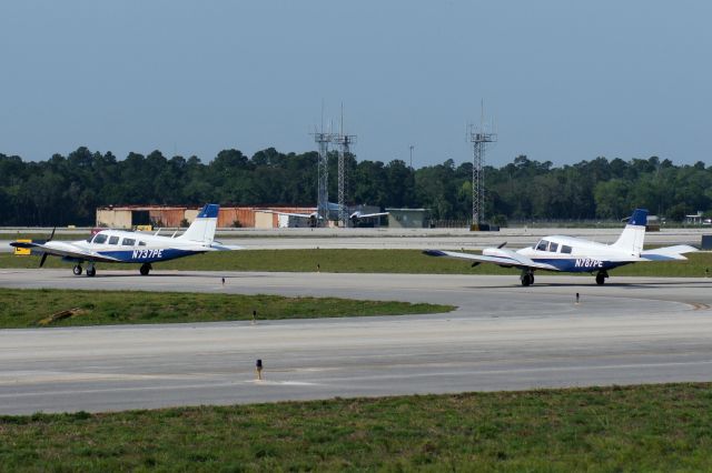 Piper Seneca (N737PE) - A pair of Phoenix East Aviations Senecas at Daytona. Like my photos? Follow me on twitter: @nsandin88