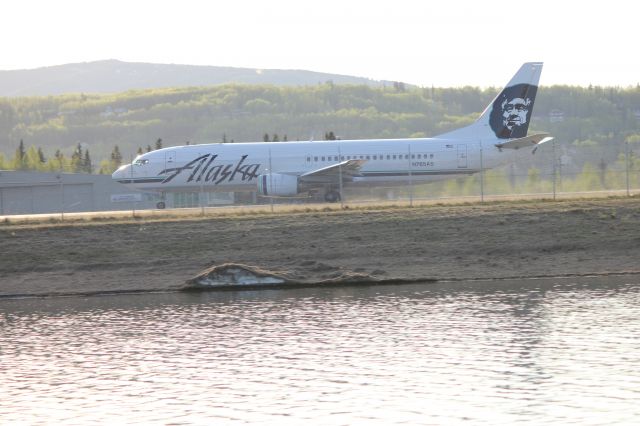 N765AS — - 1 of Alaska Airlines Q400. Note the cargo door up front. She can go full cargo or half cargo and passengers.