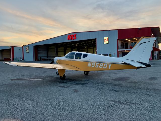 Beechcraft Bonanza (33) (N9590Y) - Evening sunset on the ramp in Longview.