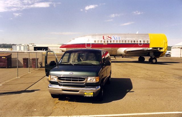 Boeing 737-200 (N235AU) - KBFI-This is the 737 that is in the Museum of Flight at Seattle. My then new 1999 Ford Club Wagon Chateau XLT was one fine rig and I wish I had never ever, ever sold it. Sept 1999.