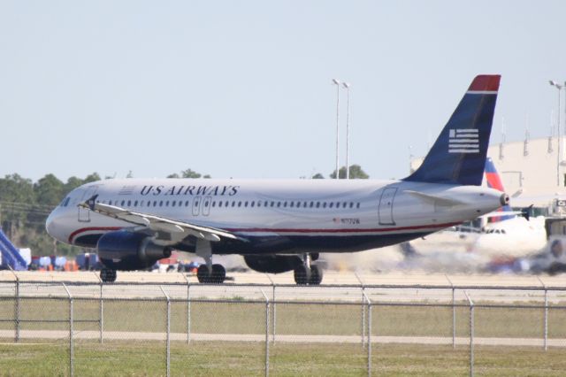 Airbus A320 (N117UW) - US Airways Flight 1930 (N117UW) departs Runway 6 at Southwest Florida International Airport enroute to Philadelphia International Airport