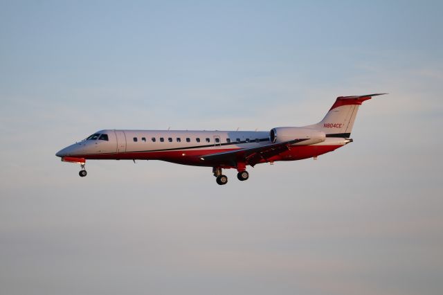 Embraer ERJ-135 (N804CE) - The pride of Cummins's fleet, their VVIP-configured regional jet on approach to 5L during golden hour