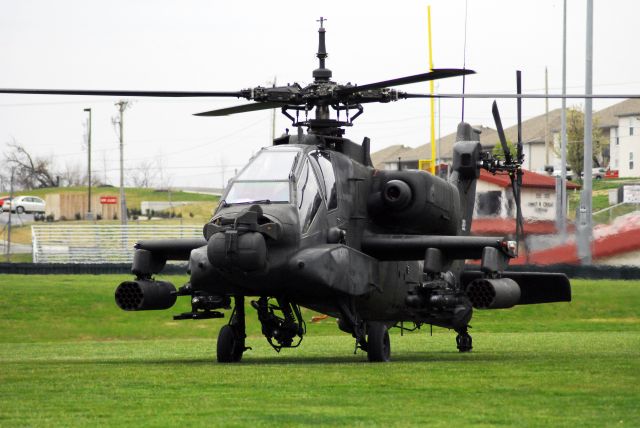 — — - AH-64 landing at the University of Central Missouri.