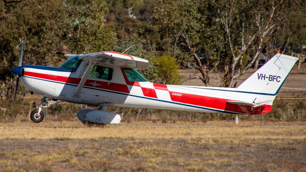 Cessna 152 (VH-BFC) - The pilot saw the group of spotters off to the side and decided to "do a wheelie" 