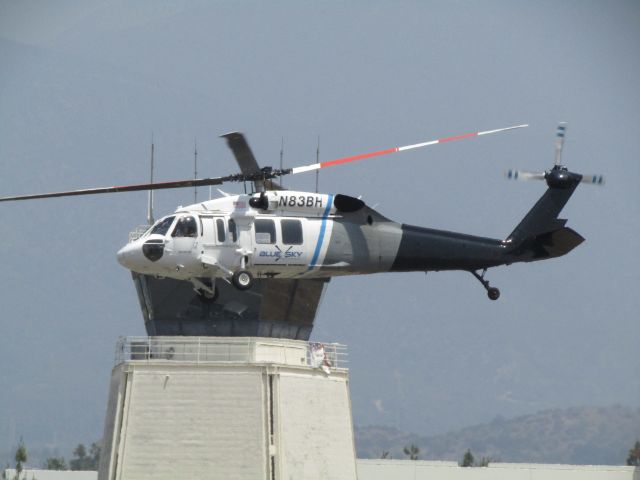 Sikorsky S-70 (N83BH) - Lifting off from Brackett Field