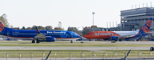 Boeing 737-800 (N834SY) - N834SY / N801SY crossing each other to get to runway / T2 respectively