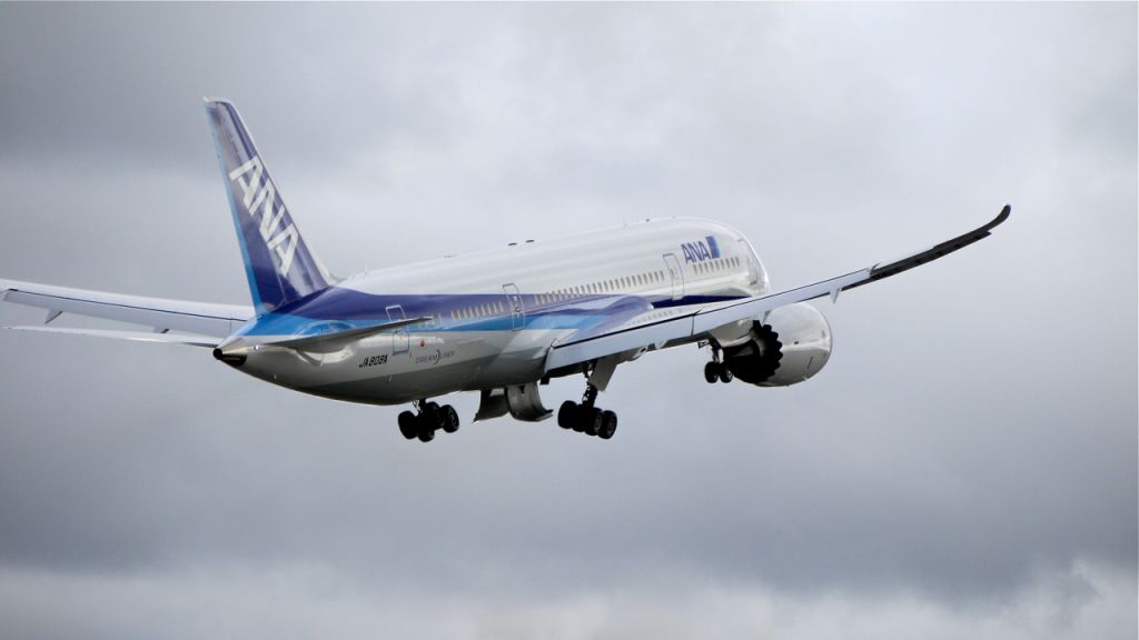 Boeing 787-8 (JA808A) - BOE105 (LN:42) flies a missed approach over runway 16R during its maiden flight on 4/1/12.