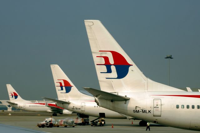 Boeing 737-700 (9M-MLK) - Sister ships ... all lined up prior to morning departure from Kuala Lumpur International Airport. 28th March, 2014.