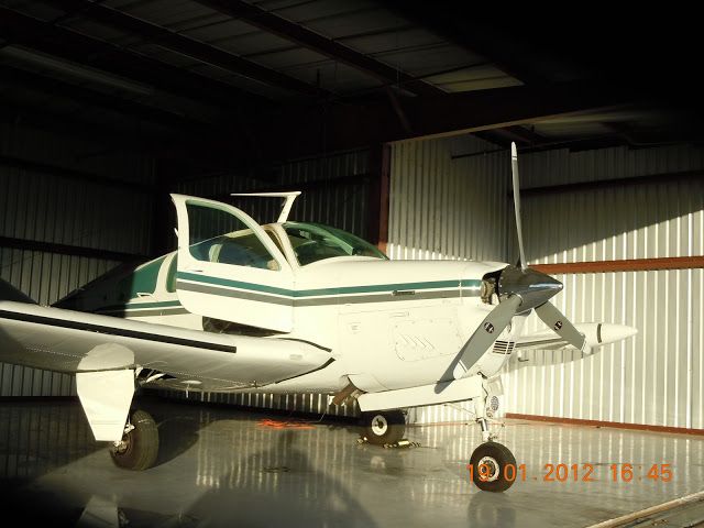 Beechcraft 35 Bonanza (N7835V) - Shining in Hanger Jan 2013