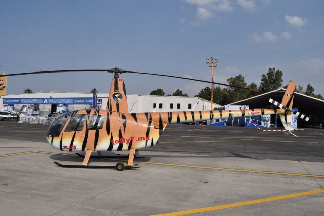 Robinson R-44 (XB-TGR) - Robinson R44 Raven II XB-TGR MSN 12111 of "Tofly7.mx" a company dedicated to special helicopter flights, on display during the open day in trade show "FAMEX 2019" at Santa Lucia AB (04/2019).