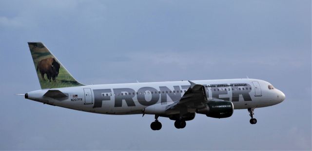 Airbus A320 (N207FR) - Landing at MIA on the 14th of May, 2018 at 7:31. Click on Full size.