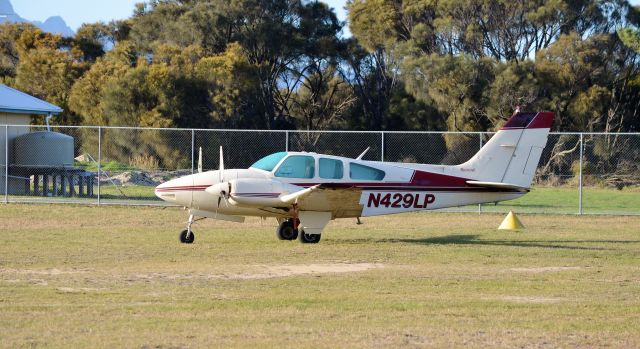 Beechcraft 55 Baron (N429LP) - Baron N429LP at Flinders Island, Apr 2017