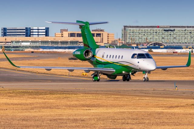 Embraer Legacy 550 (N558MG) - Taxiing in to Customs. 