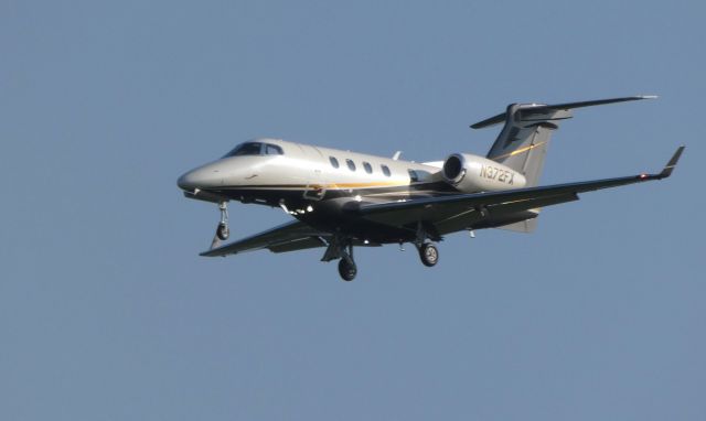 Embraer Phenom 300 (N372FX) - On final is this Embraer Phenom 300 in the Summer of 2018.