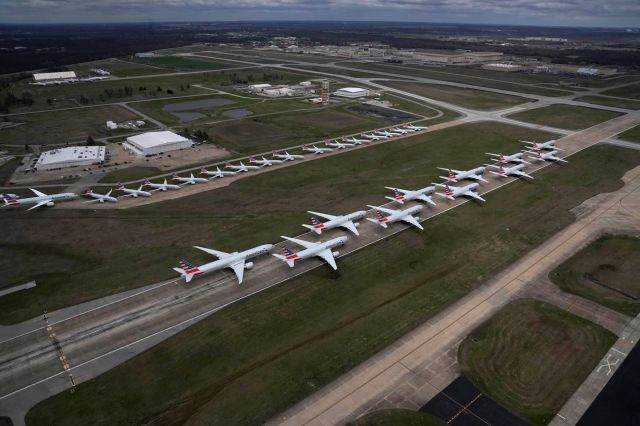 — — - COVID 19 grounding of 55 AA aircraft. 