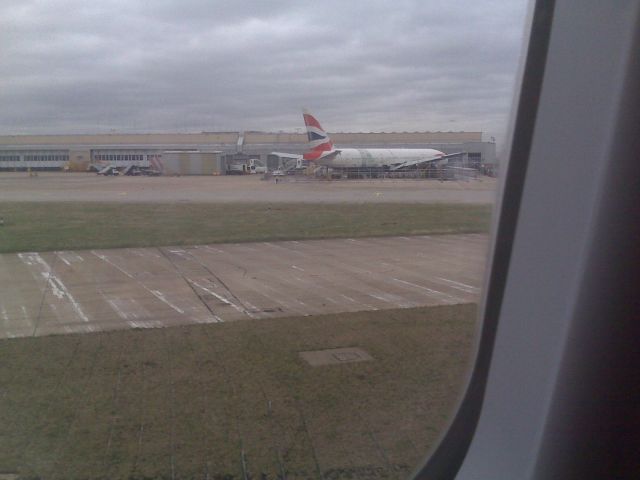 Boeing 777-200 (G-YMMM) - Photo of BA38 wreck at Heathrow viewed from 12A on VS11/22FEB during taxi for takeoff on 27L.