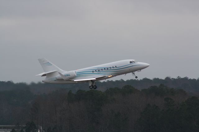 Dassault Falcon 2000 (N57AL) - N57AL taking off runway 23L