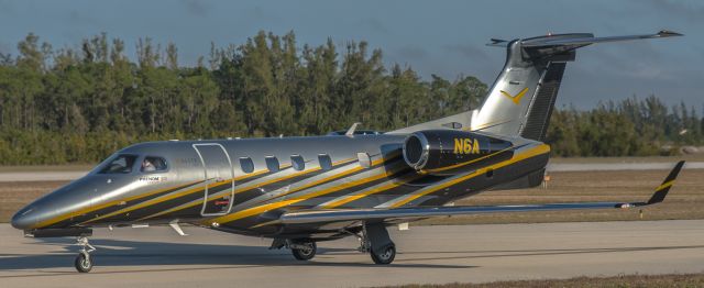 Embraer Phenom 300 (N6A) - Taxiing for an early morning departure Rwy 05