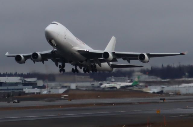 Boeing 747-400 (N702CK) - Takeoff, west side of Runway 15-33