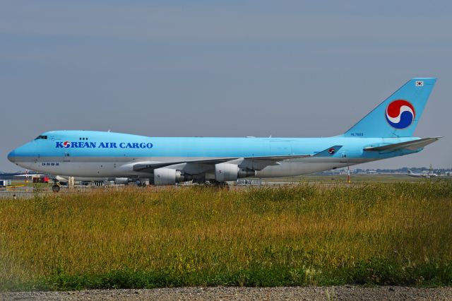 Boeing 747-400 (HL7603) - Korean Air Cargo on Apron 9 at YYC on Aug 21.