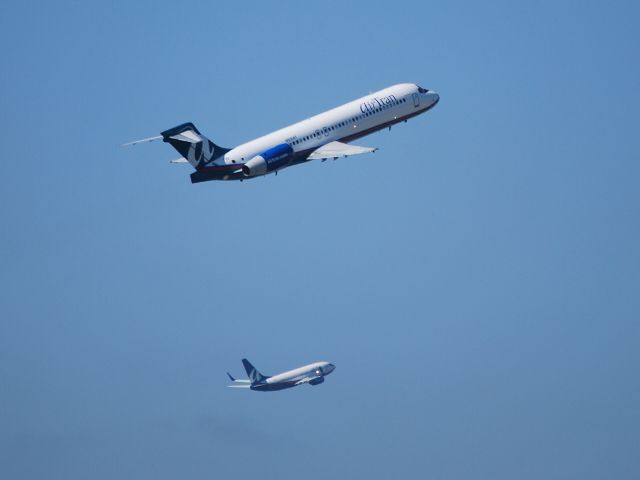 Boeing 717-200 (N930AT) - Departing runway 26R while a company 737 departs from 27R - 8/23/09