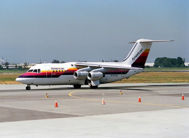 British Aerospace BAe-146-200 (N142AC) - KSJC- early 1988 after the Air Cal / AA merger, this BAe-146 aircraft still sporting Air Cal colors. Eventually, AA painted the -146 in dull gray colors before retiring the aircraft. AA should have taken them to bare metal with the AA stripe and they would have looked great.br /br /Serial number 2053 LN:53br /Type Bae 146-200br /First flight date 02/03/1986