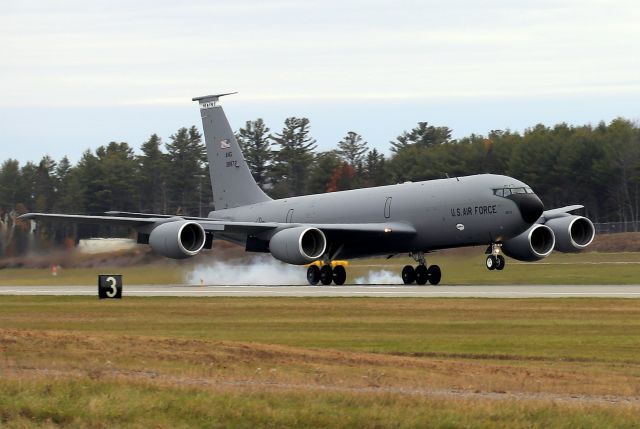 63-8875 — - 'Maine 86' touching down on runway 15