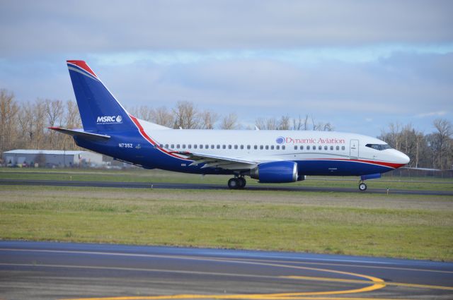 Boeing 737-500 (N735Z) - Dynamic Aviation's Boeing 737-5Y0 (N735Z) crossing 16/34 while taxiing to 31 for departure to Moses Lake (KMWH/MWH). My second time seeing one of Dynamic's rare 737-500s at Salem! This is one of three airframes currently utilized by the operator on behalf of the Marine Spill Response Corporation (MSRC).