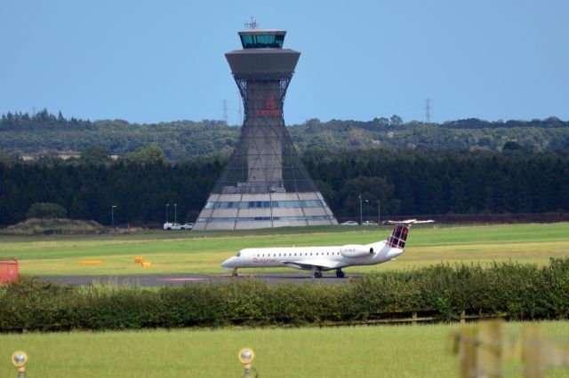 Embraer ERJ-145 (G-SAJE) - Loganair Embraer ERJ-145EP (G-SAJE) taxiing to stand after landing with NCL's Tower in background. (Photo 19 Aug 23) 