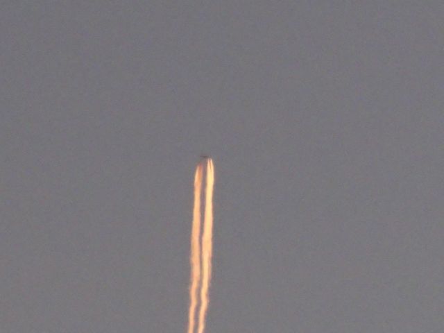 Airbus A380-800 — - DLH Flight 441 Was passing over during the sunset. Looks cool but the quality isnt great.