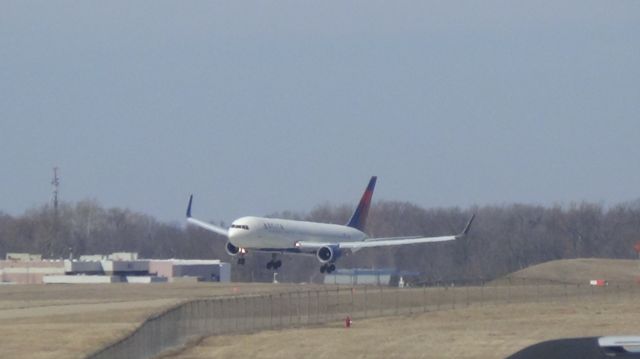 N1605 — - With a stiff cross wind, Delta arriving from Paris Charles De Guile bounces three times and finally touches down at the 4000 ft.!!  