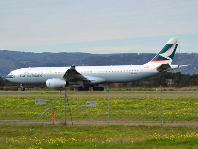 Airbus A330-300 (B-LAJ) - Rolling for take off on runway 05, for flight home to Hong Kong via Melbourne. Thursday 12th July 2012.