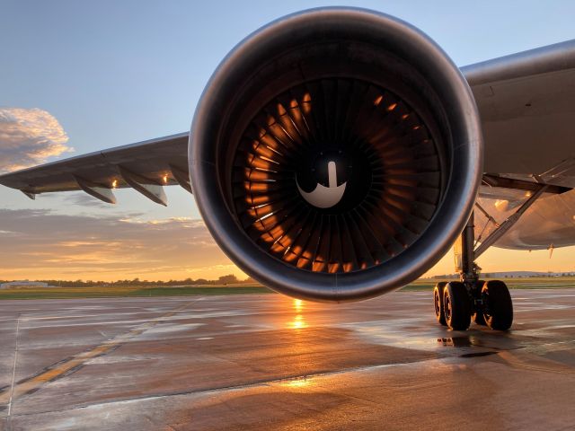 Airbus A300F4-600 (N746FD) - Flight 325 FedEx "Lucy" 's No.2 P&W 4000 is lit up by the setting sun on the Appleton Airport tarmac. 