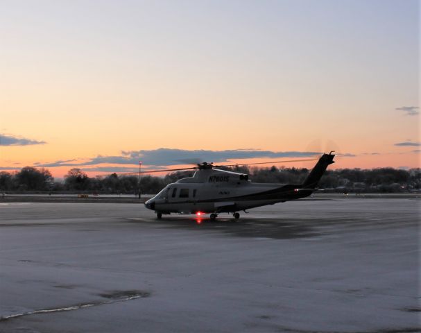 Sikorsky S-76 (N7601S) - Sikorsky S-76C operated by Associated Aircraft Group (A Sikorsky Aircraft Company) departing after a dusting from an evening snow squall.